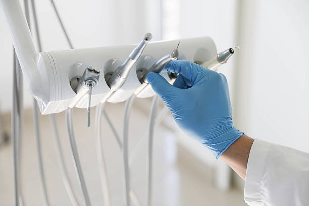 Professional Tooth Extraction technician working in St. Anthony, ID